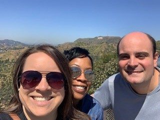 Abby, Daz, and Dan taking a selfie on a road trip in California